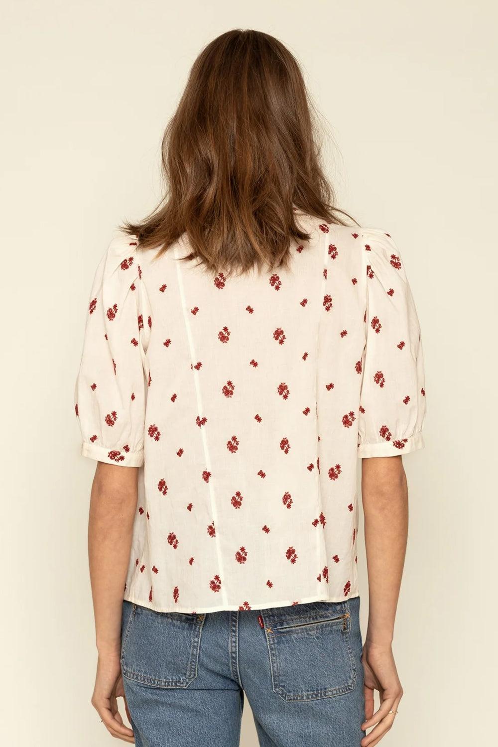 Molly Schiffly red blouse